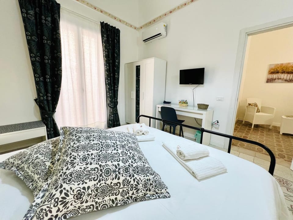 Bed, Photo of the whole room, Bedroom, towels, air conditioner