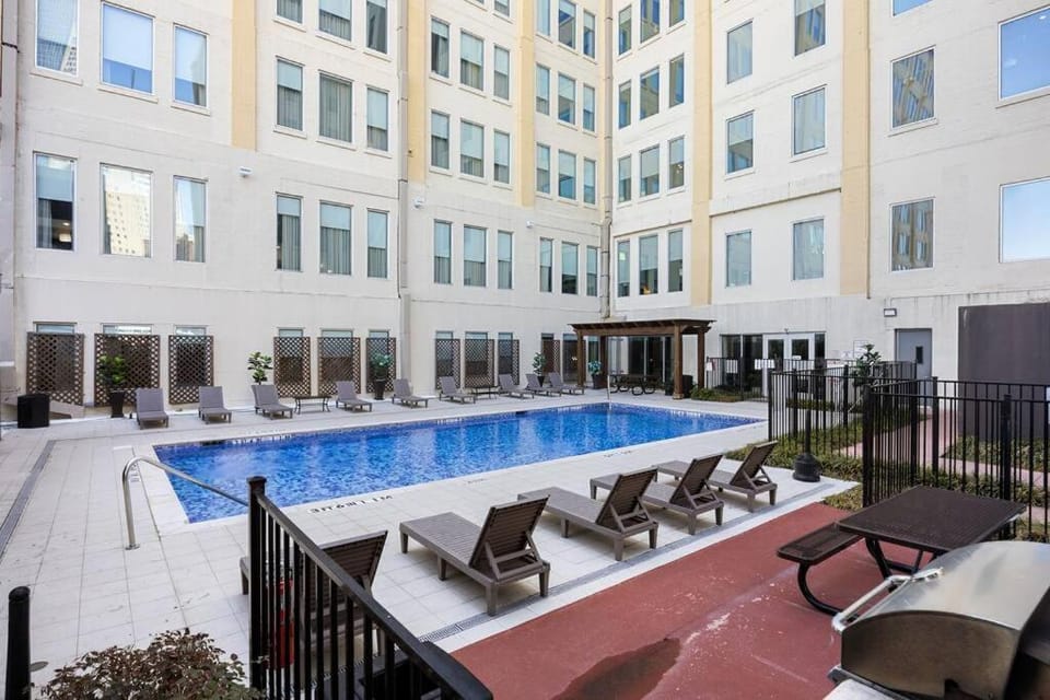 Property building, Pool view, Swimming pool, sunbed