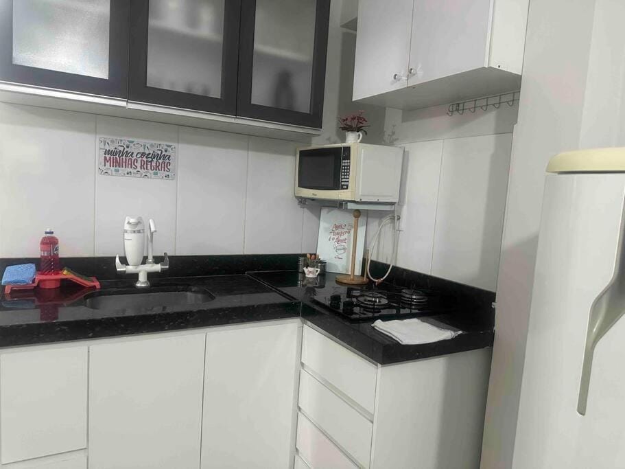 Apt 01 Central Com 2 quarto ar cond e 2 tv smart Apartment in Montes Claros