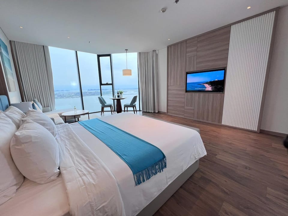 Bed, Natural landscape, TV and multimedia, Bedroom, Sea view