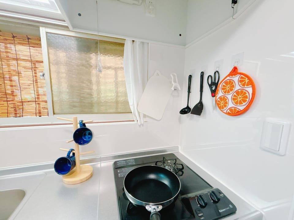 Kitchen or kitchenette, stove