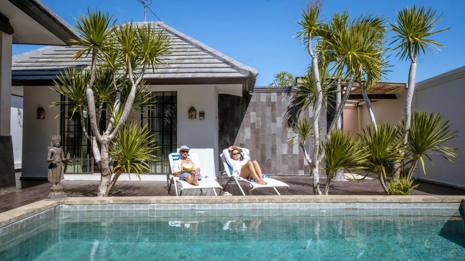 Property building, Patio, Garden, Seating area, Pool view, Swimming pool
