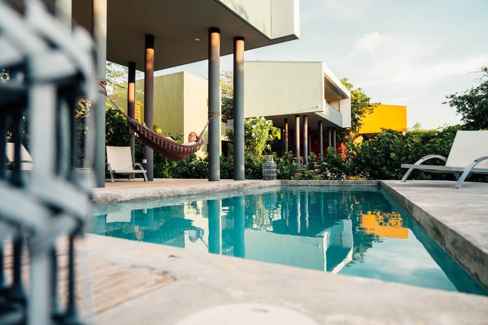 Property building, Patio, Balcony/Terrace, Pool view, Swimming pool, sunbed
