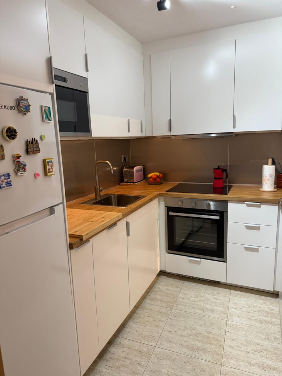 Kitchen or kitchenette, dishwasher, oven, stove, toaster