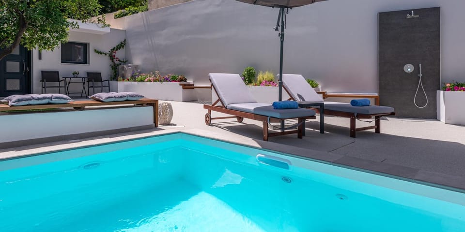 Property building, Patio, Living room, Seating area, Pool view, Swimming pool, sunbed