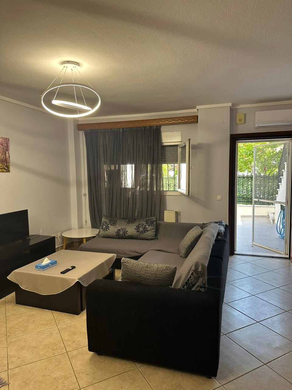 TV and multimedia, Living room, Dining area, furniture, air conditioner