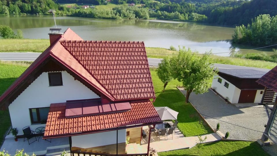 Property building, Natural landscape, Lake view, Mountain view