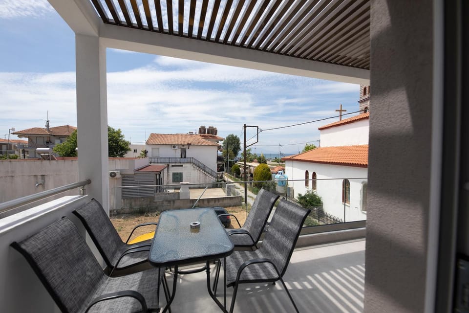 Property building, Patio, Day, View (from property/room), Balcony/Terrace, Balcony/Terrace, Seating area, Dining area