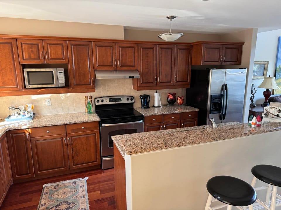 Kitchen or kitchenette, dishwasher, microwave, oven, stove, toaster, kitchen