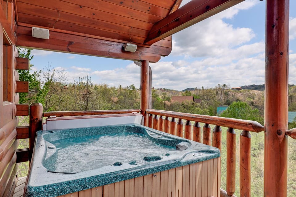 A Taste Of Honey is a dog-friendly two bedroom true log cabin nestled inside the Starr Crest resort Cabin in Sevier County