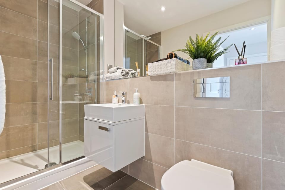 Shower, Toilet, Bathroom, Bath, hair dresser, hair dryier, towels