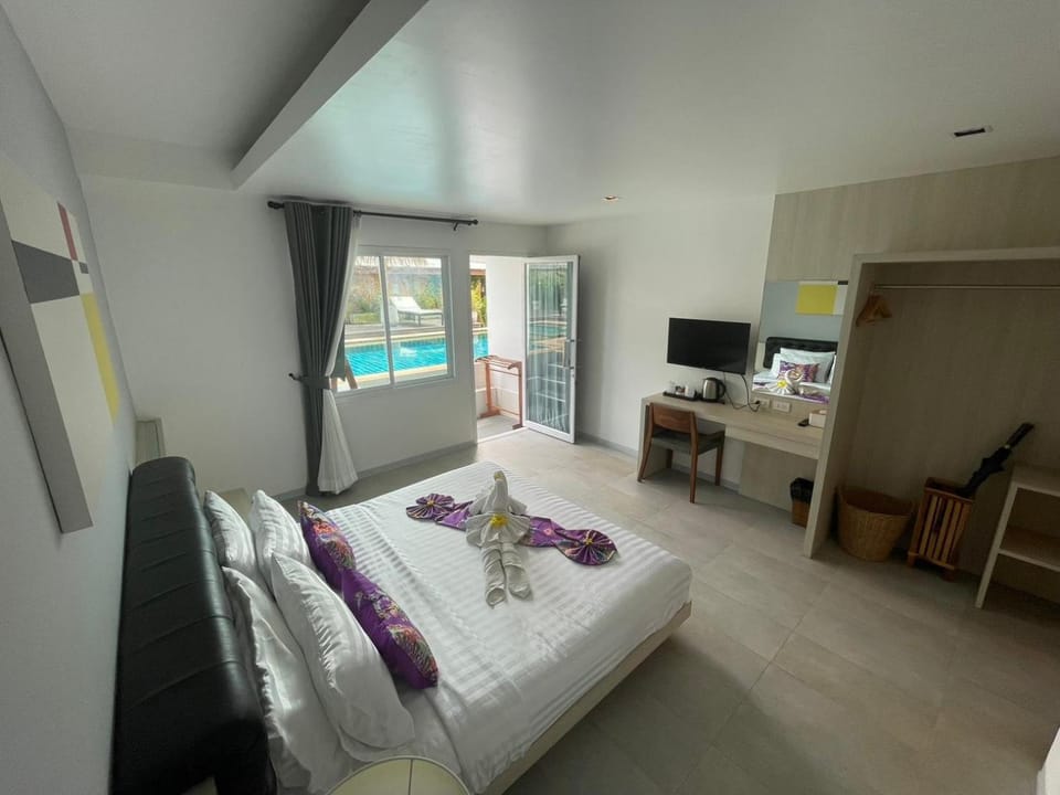 Bed, Seating area, Bedroom, Pool view, Swimming pool, towels