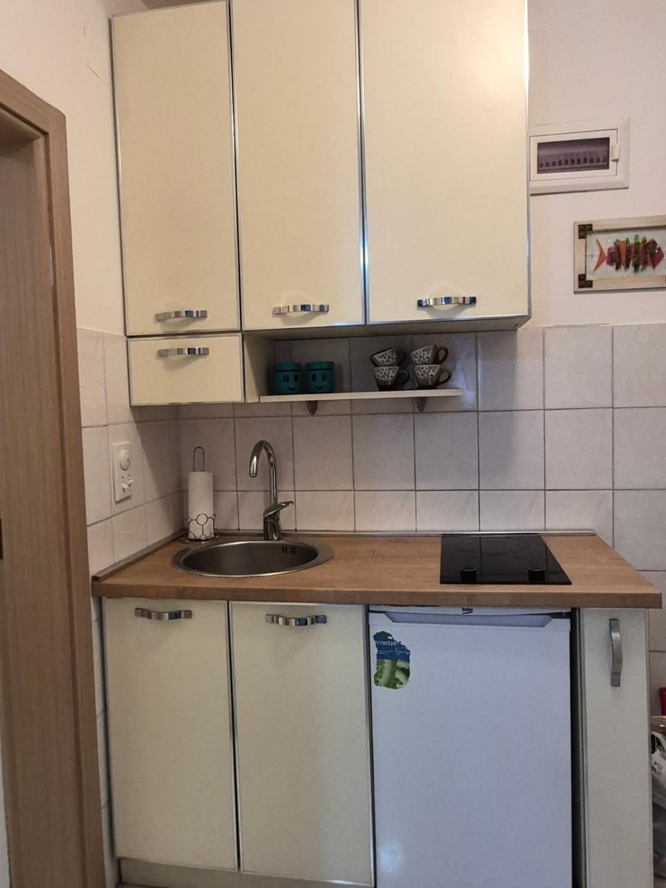 Kitchen or kitchenette, stove