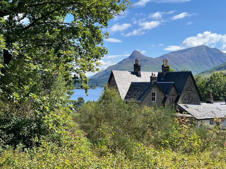 Property building, Natural landscape, Lake view, Mountain view