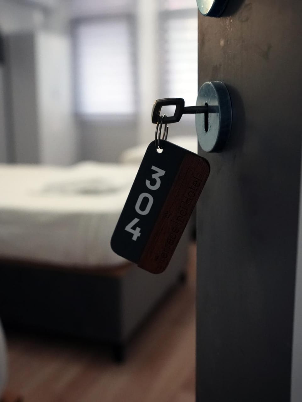 Bed, Property logo or sign, Photo of the whole room, Logo/Certificate/Sign, Bedroom, Text overlay, bunk bed, Certificate/Award