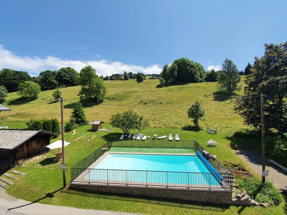 Property building, Living room, Swimming pool