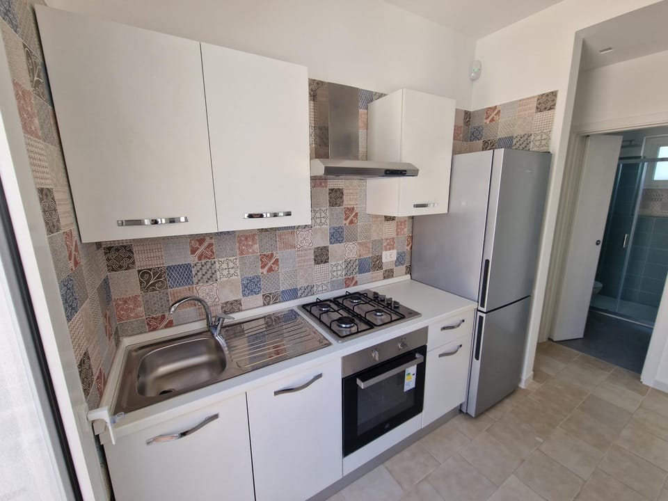 Kitchen or kitchenette, oven, stove