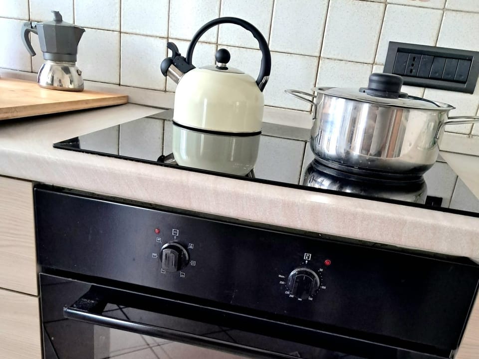 Kitchen or kitchenette, stove