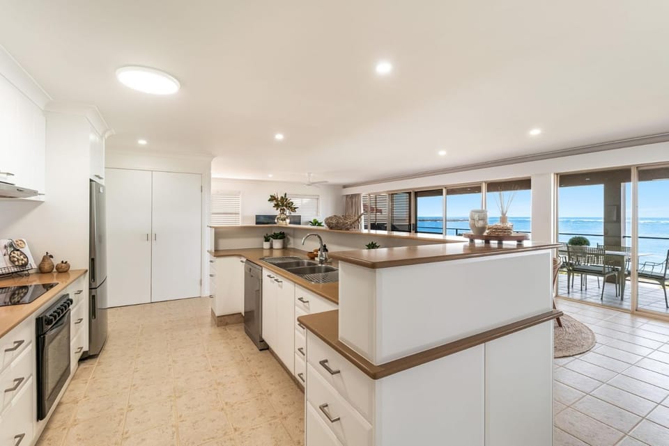 Kitchen or kitchenette, dishwasher, oven, stove, toaster