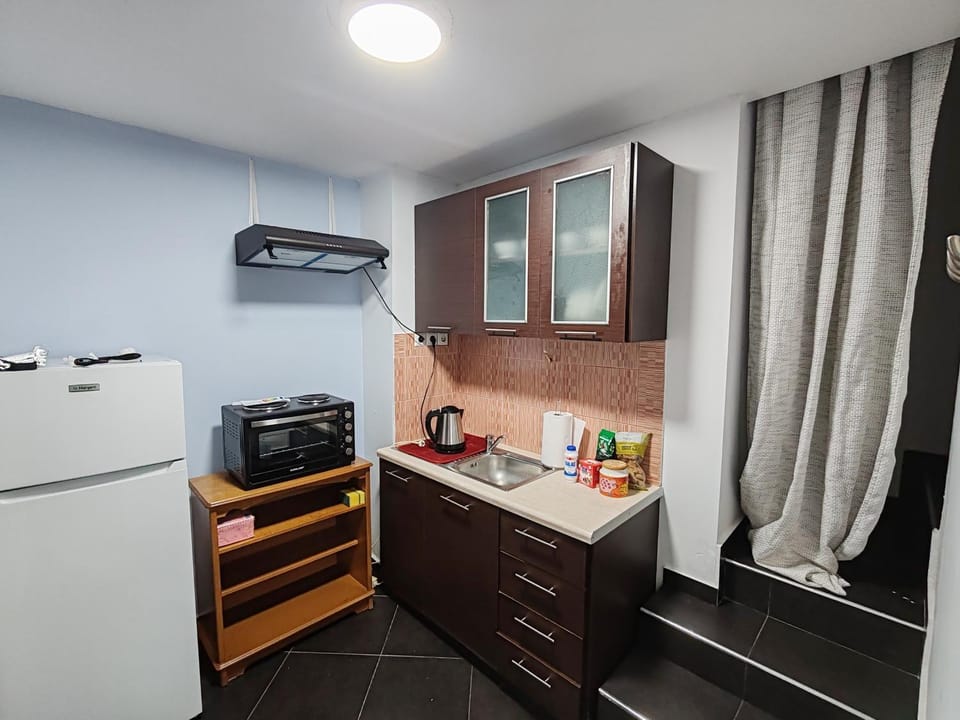 Kitchen or kitchenette, stove