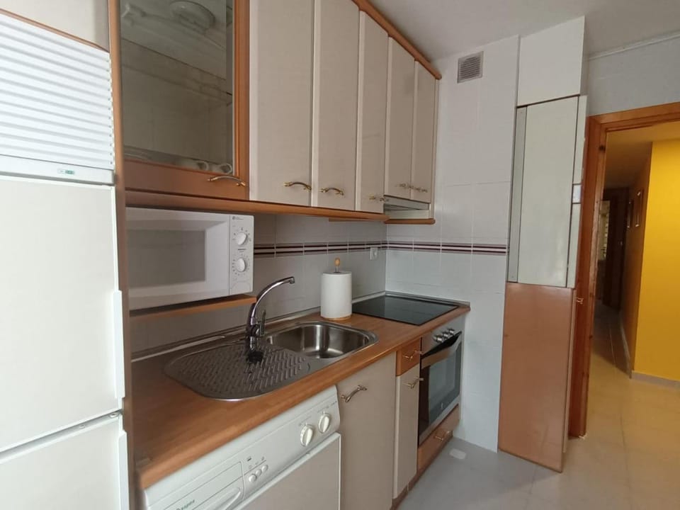 Kitchen or kitchenette, oven, stove, toaster