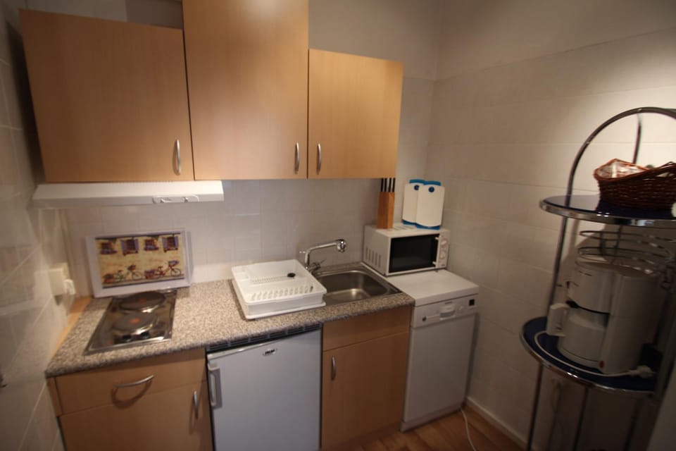 Kitchen or kitchenette, stove