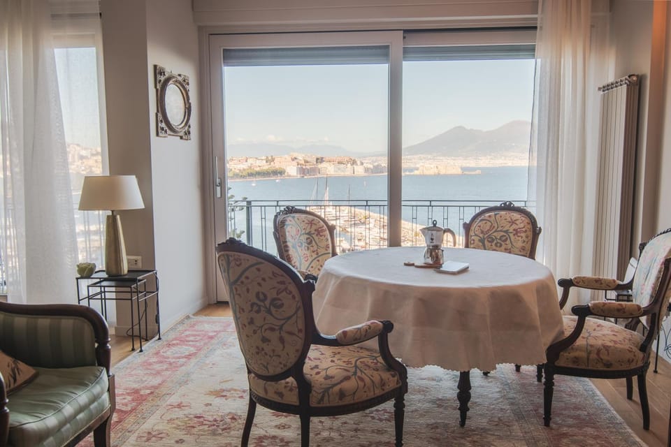 Natural landscape, View (from property/room), Balcony/Terrace, Living room, Seating area, Dining area, Lake view, River view, Sea view