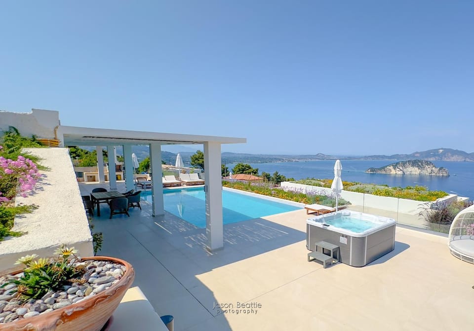 Property building, Hot Tub, Seating area, Sea view, Swimming pool