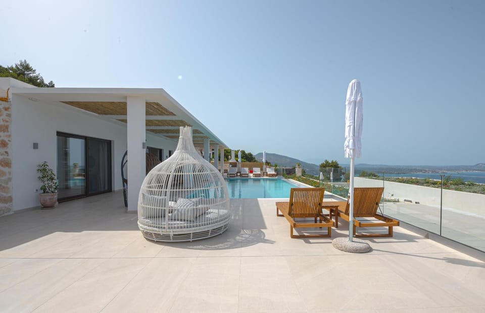 Property building, Patio, View (from property/room), Balcony/Terrace, Pool view, Sea view, Swimming pool