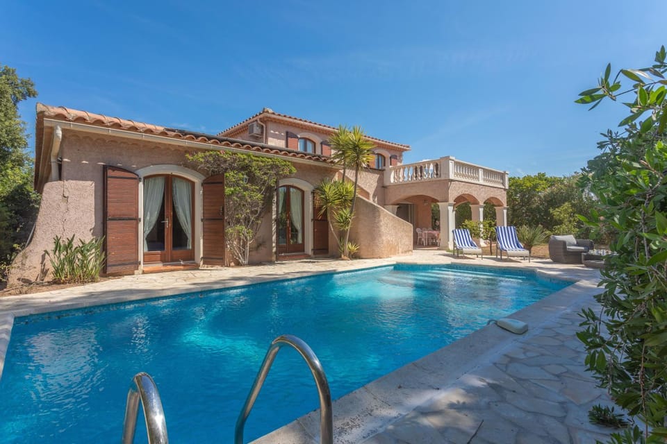 Property building, Living room, Swimming pool