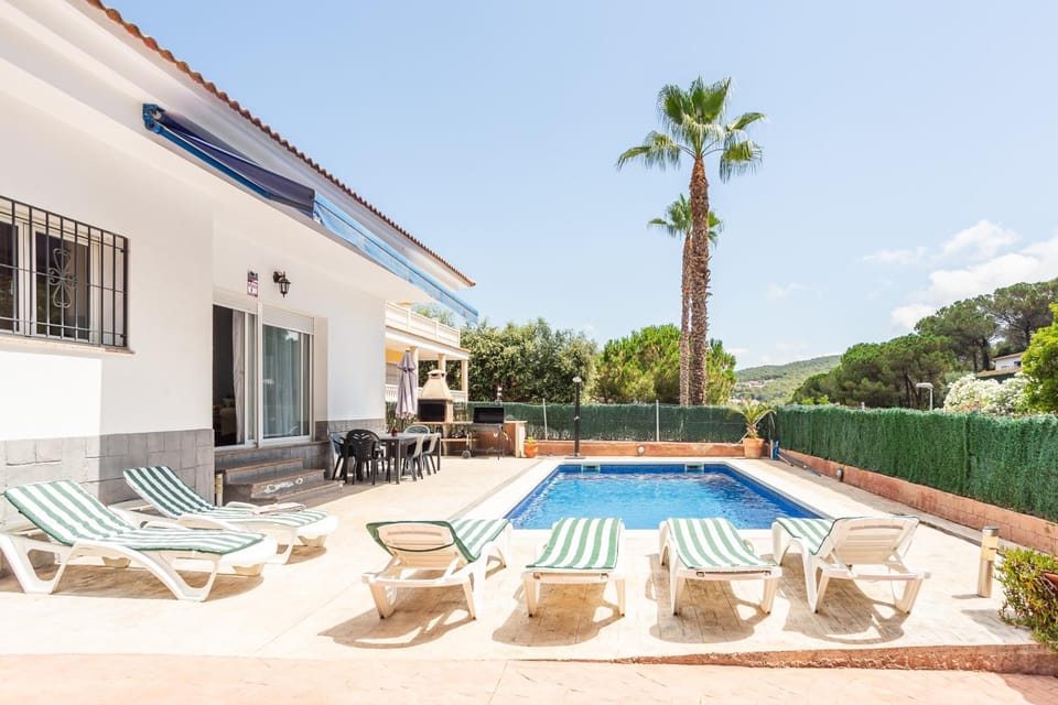 Property building, Living room, Swimming pool