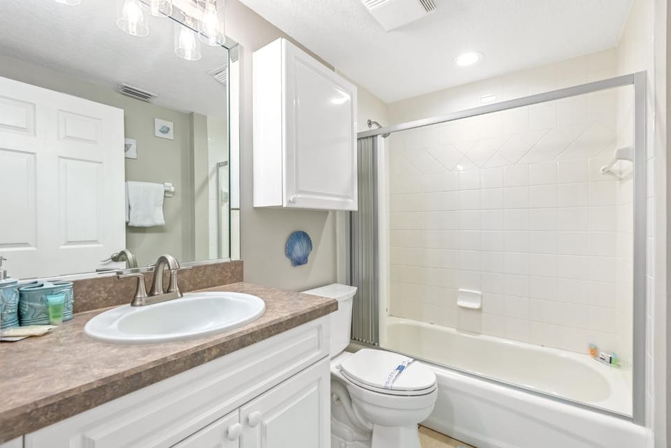 Oceanwalk 2BR | Estuary & Bay Views, Sunset Balcony & 3-Min Beach Walk Apartment in Edgewater