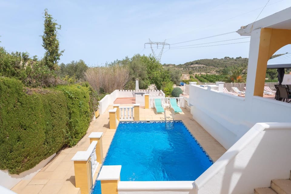 Property building, Living room, Swimming pool