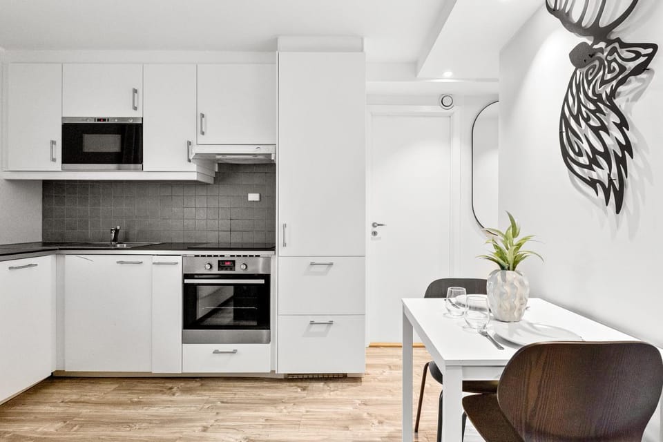 Kitchen or kitchenette, Dining area, dishwasher, microwave, oven, stove