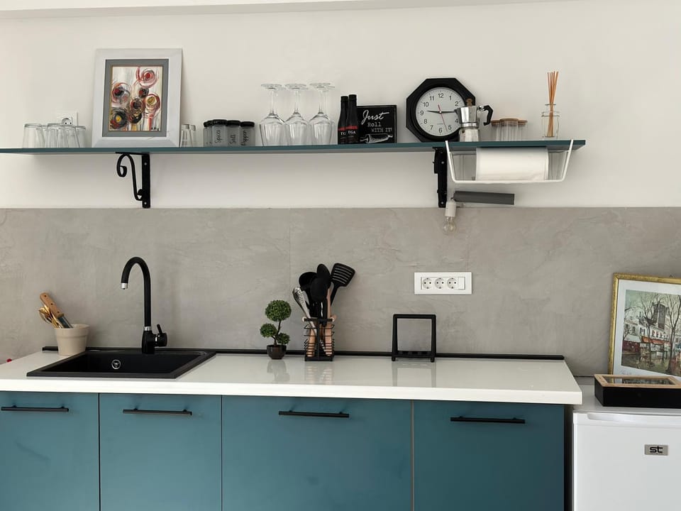 Kitchen or kitchenette, stove