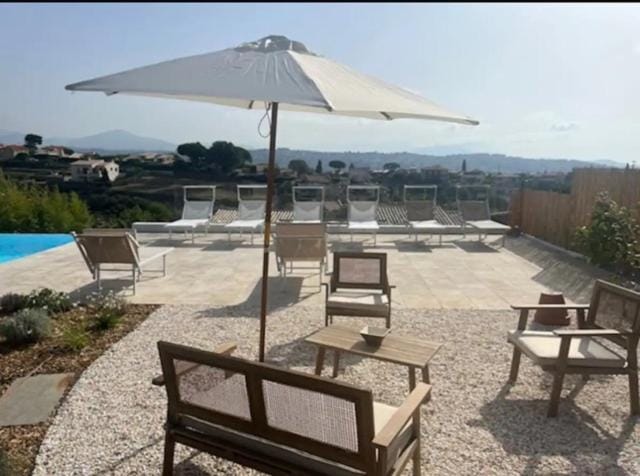 Patio, Day, Natural landscape, Mountain view, Pool view, Swimming pool, sunbed