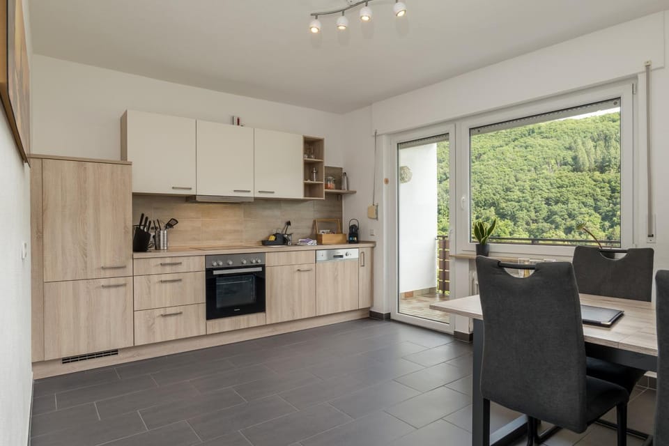 Kitchen or kitchenette, Dining area, dishwasher, stove, toaster