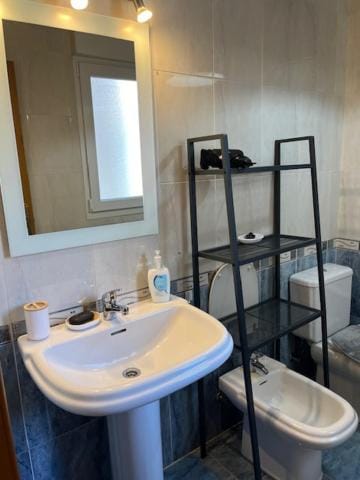 Bathroom, hair dryier, towels