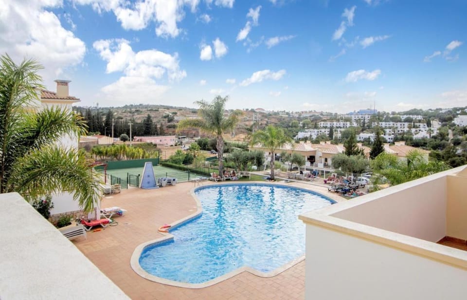 Swimming pool, sunbed