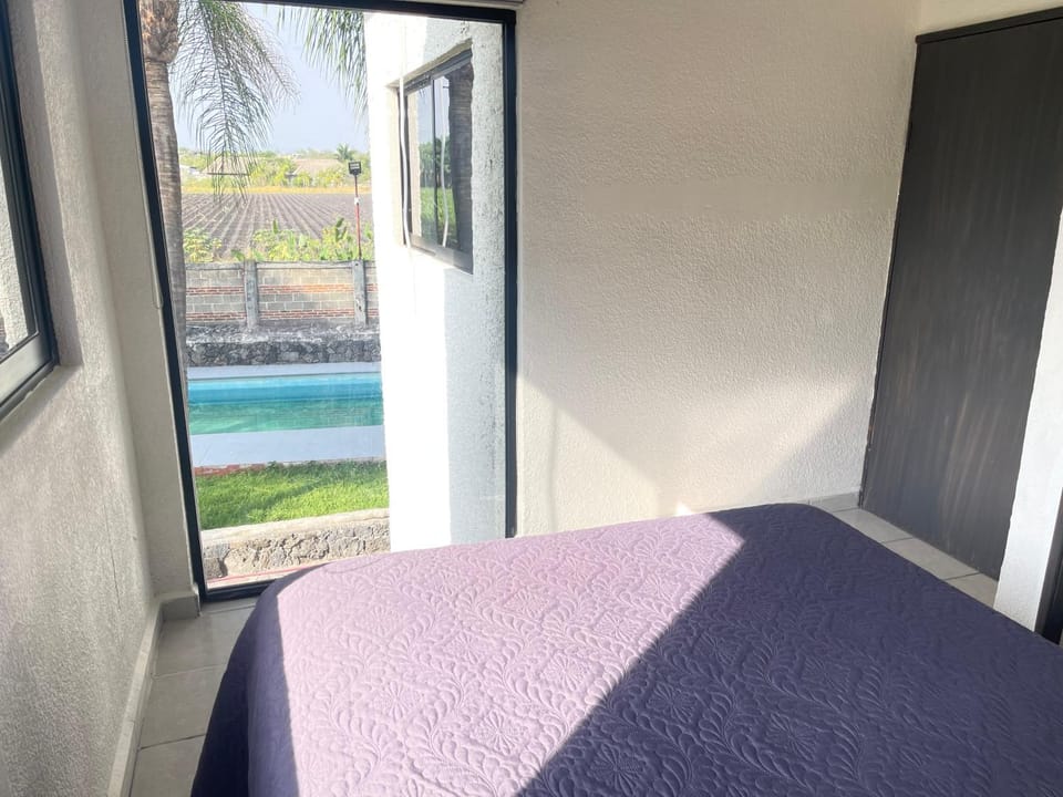 Bed, Photo of the whole room, Bedroom, Pool view, Swimming pool