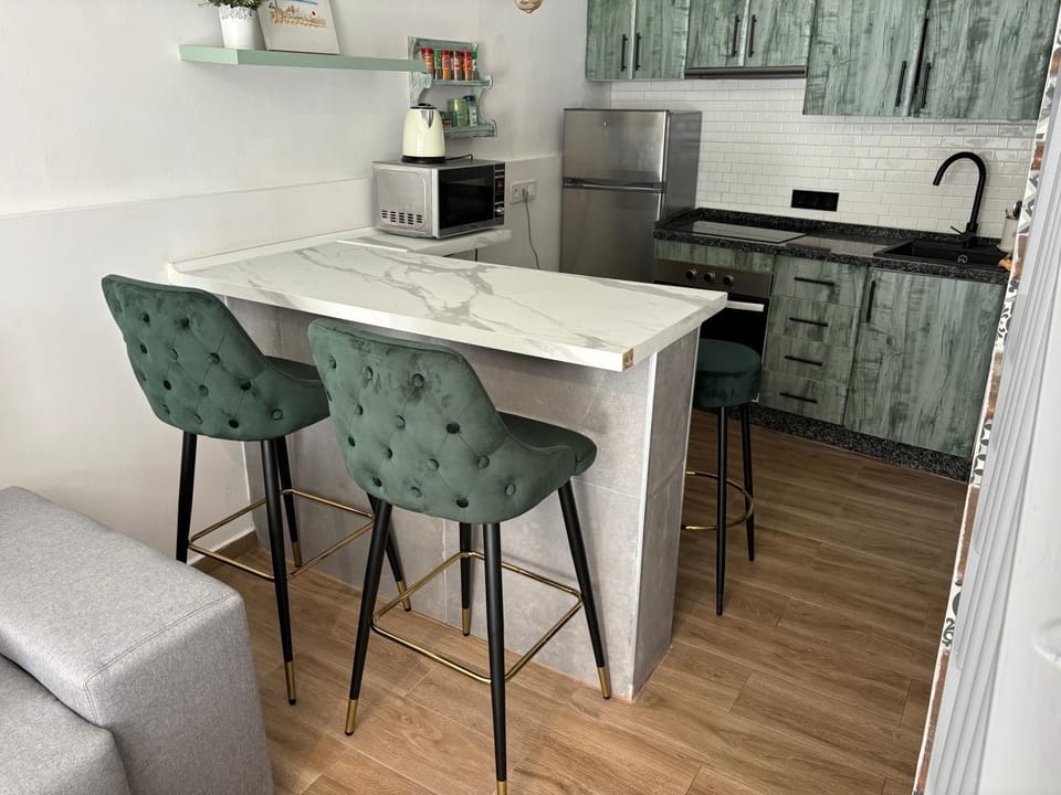 Kitchen or kitchenette, oven, stove