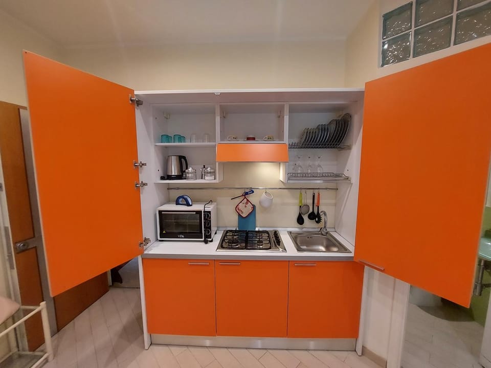 Kitchen or kitchenette, oven, stove