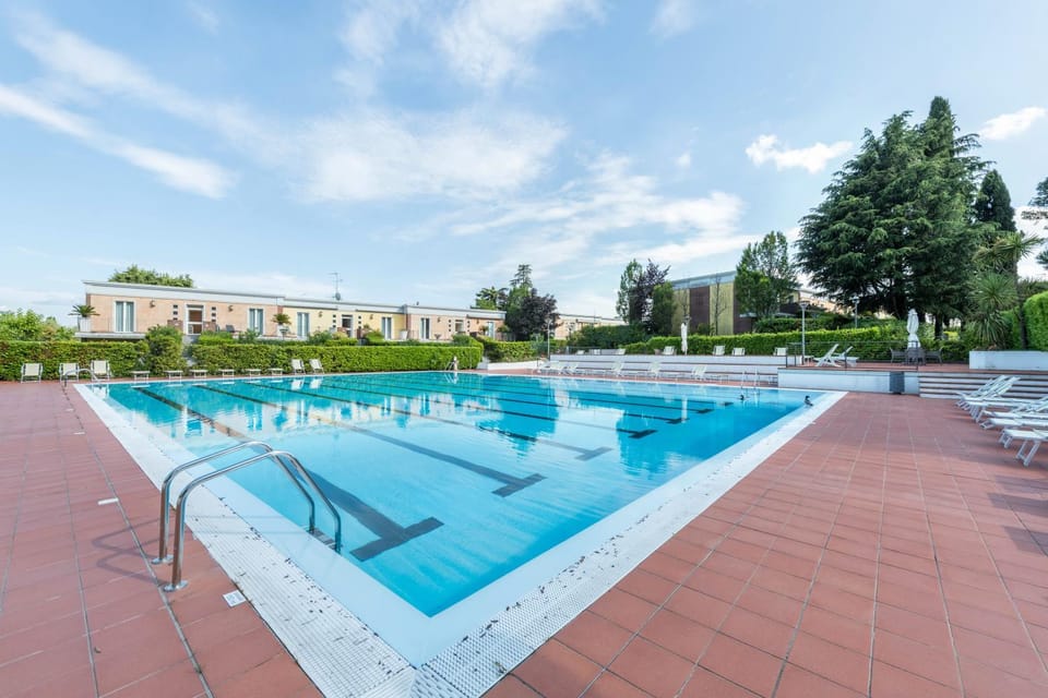 Property building, Living room, Swimming pool