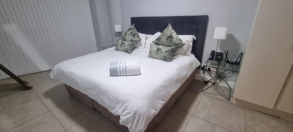 Bed, Bedroom, hair dryier, towels