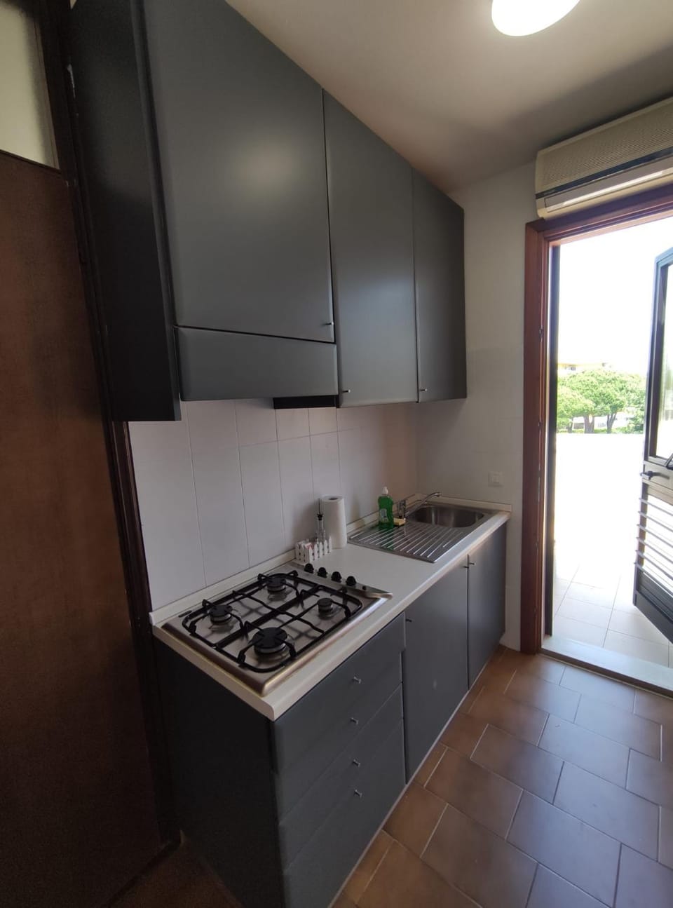 Kitchen or kitchenette, stove