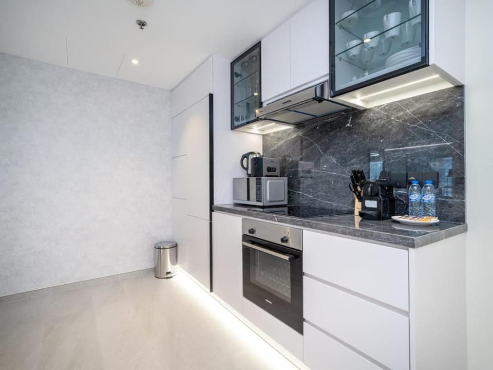 Kitchen or kitchenette, oven, stove