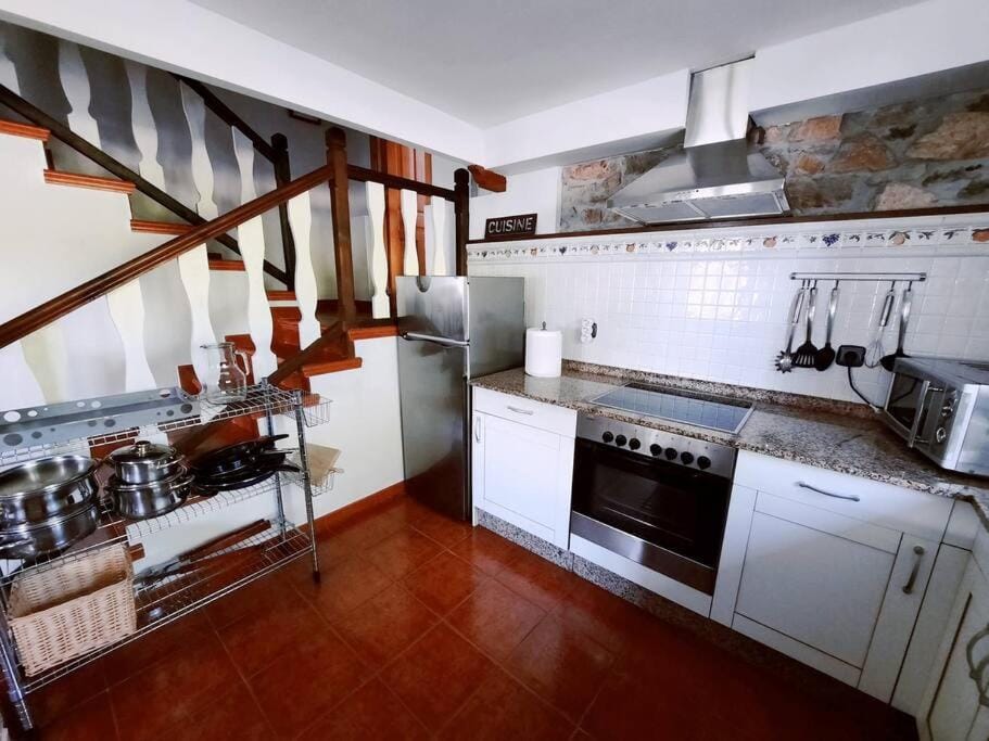 Kitchen or kitchenette, oven, stove, toaster