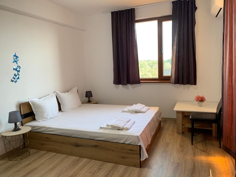 Bed, Photo of the whole room, Bedroom, towels, air conditioner