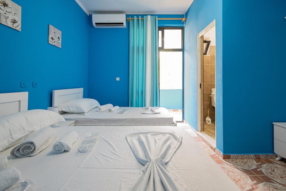 Bed, Photo of the whole room, Bedroom, towels, air conditioner