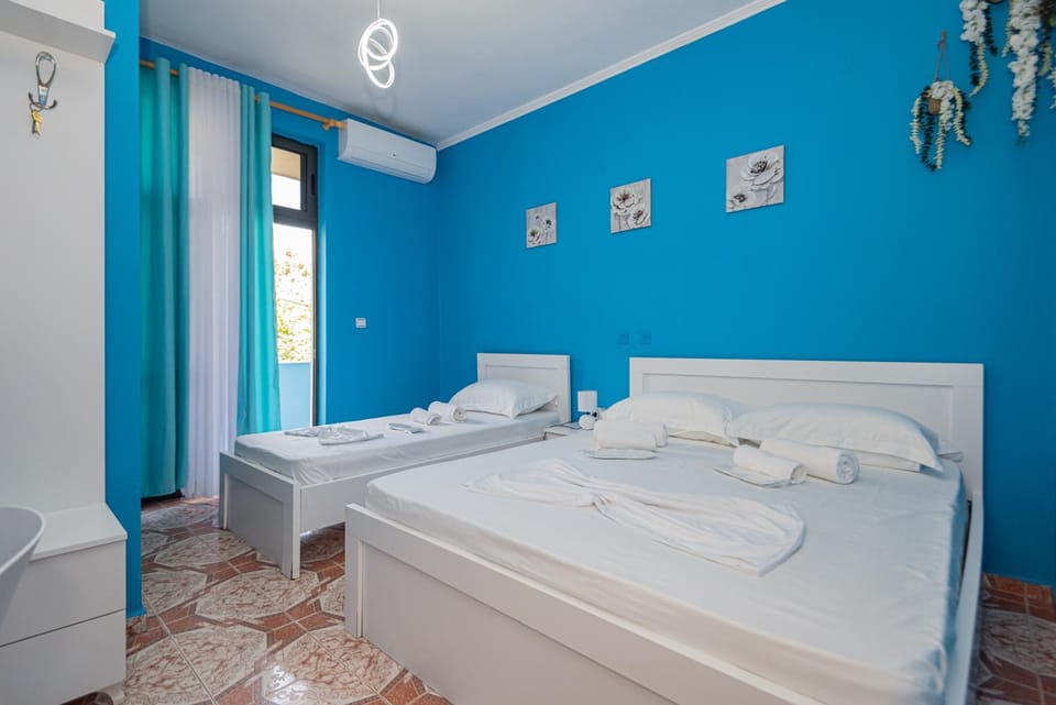 Bed, Bathroom, Photo of the whole room, Bedroom, towels, air conditioner